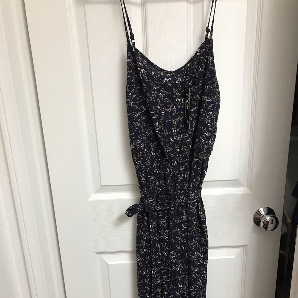 Navy blue floral cropped leg jumpsuit